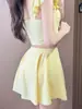 Biquíni Amarelo Duas Peças Feminino 2026 Novo Sensação de Alto Padrão Estilo Saia Dividida Emagrecedor Roupa de Banho Férias Roupa de Banho Estudante Feminina