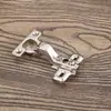 Fabricantes transfronterizos al por mayor 26 tazas bisagra mini hidráulica amortiguador de amortiguación hidráulica puerta de armario silenciosa bisagra de taza pequeña