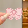 Dulces accesorios para el cabello de otoño e invierno para mujer, con un diseño de caricatura y un estilo divertido y juguetón, con una nueva colección 2026 de lindos pasadores para el cabello para niños