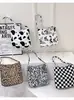 Bolso tote nuevo con estampado de leopardo transfronterizo, bolso de hombro de gran capacidad para el trabajo, bolso cruzado versátil y elegante, bolso de mano de alta gama para mujer
