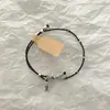 Pulsera Trenzada Simple de Estilo Chino Nuevo con Pez Pequeño y Mariposa Diseño de Nicho Estilo Literario de Alta Gama Joyería de Mano Versátil