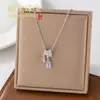 Colar de borla de diamante com esmalte de gota de luxo leve estilo francês microincrustado para mulheres, corrente de clavícula doce de dopamina da moda de alta qualidade