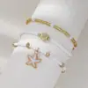 Tobillera de estilo bohemio retro playero europeo y americano con cuentas de vidrio de estrella de mar, tobillera de aleación de estrella de mar con cordón elástico multicapa