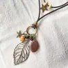 Collar de Pluma de Bronce para Mujer, Estilo Étnico Bohemio, Diseño Largo de Doble Capa, Accesorio de Alta Gama con un Toque de Nicho y Sofisticado