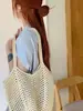 Bolso de paja de gran capacidad estilo casual modelo nuevo 2026 estrella de mar sensación relajada bolso de mano estilo vacación en la playa bolso de hombro