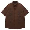Camisa Casual Cool Estilo Americano Bordado Floral Modelagem Solta Cool Unissex Manga Curta Camisa de Veludo Cotelê Tendência para Adolescentes