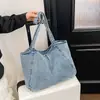 Bolso de Mezclilla Lavada Versátil Estilo Coreano para Mujer 2026 Nuevo Retro Casual de Hombro Único y de Mano de Gran Capacidad