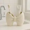 Soporte para cepillos de dientes/portalápices con lazo transfronterizo Soporte para cepillos de dientes/portalápices con lazo