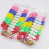 Venta al por mayor del fabricante Silbatos de plástico de colores Juguetes de puesto callejero para niños Silbatos de árbitro para competiciones de aficionados con cordón para uso en fútbol
