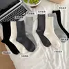 Calcetines Grises Versátiles para Mujer de Media Pantorrilla Color Sólido Algodón Estilo Coreano Deportivos Blancos Largos Calcetines de Felpa Suelta