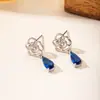 Brincos de Flor de Rosa de Cobre com Zircônia de Luxo Leve para Mulheres, Brincos Versáteis de Alta Qualidade, Brincos de Personalidade da Moda Europeia e Americana Atacado