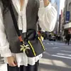 Bolso cubo transfronterizo nuevo, bolso pequeño ligero y casual de moda para exteriores, bolso de hombro cruzado versátil con bloques de color para el trabajo