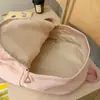 Nova mochila de moda em relevo de grande capacidade estilo ins, simples e versátil, adequada para estudantes do ensino fundamental, médio e universitário
