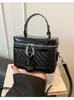 Bolso de mano pequeño de lujo ligero transfronterizo para mujer, nuevo modelo de otoño 2026, patrón tejido, versátil y moderno, bolso cuadrado pequeño de un solo hombro y cruzado