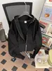 Ventas Directas de Fábrica Otoño Nuevo Diseño de Nicho Americano Chaqueta Corta con Capucha de Perlas para Hombre Chaqueta Negra Retro