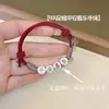 Pulsera de Hilo Rojo de Plata Pura 999 Doble Cara de Paz y Alegría para Mujeres en su Año Zodiacal, Joyería de Pareja de Diseño de Nicho Tendencia China