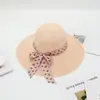 Nuevo sombrero de verano grande a lo largo sombrero de playa cinta tejido verano señoras mayores transpirable sombrero protector solar venta al por mayor
