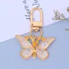 Llavero de Mariposa con Gradiente de Colores Acrílico Colgante para Bolso y Funda de Auriculares Accesorios Colgantes DIY para Niña Regalo