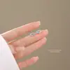 Pendientes de Zirconia Serie Topacio Azul de Verano para Mujer Estilo Coreano Pendientes de Corazón de Plata de Ley S925 Pendientes de Gama Alta Venta al por Mayor