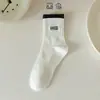 Calcetines de mujer colección otoño, blancos, con puño de canalé doble, calcetines de media caña casuales y deportivos, absorbentes del sudor y transpirables, adecuados para viajes de negocios, viajes y uso diario.