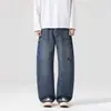 Jeans casuales americanos de moda de pierna ancha con estampado de salpicaduras para hombre, corte recto, holgados, estilosos, con caída, que alargan las piernas, perfectos para primavera y otoño, con un ambiente relajado y sin esfuerzo