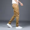 Pantalones casuales blancos para hombre, nuevo modelo otoño 2026, rectos ajustados, versátiles para negocios, pantalones largos de primavera y otoño para hombre