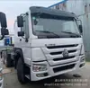 Exportación para Venta Cabeza de Tractor Usada Howo Tractor Doble Tracción 375 Caballos de Fuerza Cabeza de Camión de Transporte Usada