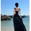 Top Tubo Preto + Saia Longa Flare de Cintura Alta 2026 Verão Emagrecedor e Elegante Conjunto de Duas Peças Vestido Longo para Férias na Praia