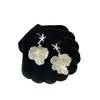 Pendientes de pétalos de estrella de mar estilo vacación en la playa, de alta gama y etéreos, pendientes versátiles con un toque de nicho, ambiente suave y fresco.