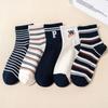 Calcetines de algodón para mujer hasta la mitad de la pantorrilla otoño e invierno absorbentes de sudor pies sin olor estilo marino calcetines deportivos a rayas con letras al por mayor
