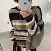 Suéter de punto hueco a rayas bicolor para mujer, estilo fino, nuevo modelo otoño 2026, cuello redondo, corte holgado, adelgazante, top suéter de manga larga