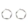 Pendientes de Metal Retorcido Personalizados de Moda Transfronterizos Temperamento Lujo Ligero Único Fresco Diseño de Estilo Pendientes al por Mayor