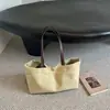 Bolsa de lona de gran capacidad para mujer, nueva bolsa de mano casual de otoño 2026 para la escuela y el trabajo, de hombro y de mano