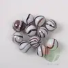 20 piezas 16mm canicas de vidrio de ocho pétalos color crema morado 1.6cm blanco porcelana negro bola de sandía juguete nostálgico 120g