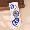 Nuevo llavero transfronterizo con colgante de elefante, palmera y pavo con ojos azules, para bolso o coche.