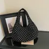 Bolso tote minimalista de estilo coreano con textura de lunares para el hombro para mujer, nuevo modelo 2026, alto valor estético, bolso de mano y bolso de hombro únicos para mujer
