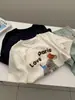 Camiseta de Manga Corta de Tejido Cepillado para Mujer, Estilo Coreano, Cuello Redondo, Hombro Normal, Capa Base, con Bordado de Cachorro, Primavera Temprana 2026