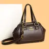 Bolso de mano con cierre de alta gama transfronterizo para mujer, diseño nuevo, elegante y sencillo, adecuado para madres de mediana edad, bolso de hombro y cruzado