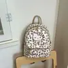 Mochila estilo coreano com bolinhas, estilo girlie, alto valor estético, design fofo de gato, mochila de grande capacidade para estudantes, adequada para escola e deslocamento