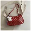Bolso brillante de charol de lunares de nicho para mujer, nuevo bolso cruzado de moda 2026, bolso para el hombro y debajo del brazo súper popular