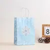 Bolsa de regalo para fiesta de Navidad transfronteriza, copo de nieve de invierno, bolso de mano de papel Kraft, bolsa de regalo navideña