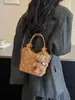 Cross2026 Otoño Invierno Nuevo Estilo Coreano Estilo Perezoso Bolso Cubo Bolso de Mano Corazón Elegante Moda Bolso de Hombro Cruzado Individual