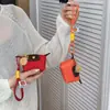 Bolso Mini de Nylon para Mujer Estilo Nuevo Transfronterizo, Bolso de Mano de Moda para Guardar Labiales, Bolso Pequeño Colgante Elegante