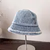 Sombrero de pescador de mezclilla de estilo nuevo para verano con bordes deshilachados para mujer, versátil y elegante, hace que la cara se vea más pequeña, sombrero de protección solar, moderno