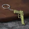 Chaveiro modelo pistola, pingente de arma de fogo em liga vintage, acessório para bolsa masculina, mercadoria de jogo, atacado de pequenos presentes