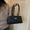 Bolso tipo baguette de platino de un solo hombro de estilo coreano para mujer, nuevo modelo 2026, de alta gama, gran capacidad, adecuado para el uso diario, bolso de axila