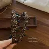 Diadema de tela con estampado de leopardo dentada, Moda retro francesa, Pinza para el pelo de alta gama, Accesorio para el cabello, Nuevo 2026