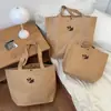 Bolsa de Papel Kraft com Desenho de Filhote Nova Grande Capacidade Bolsa Tote Simples Viagem de Negócios Deslocamento Bolsa de Ombro Versátil