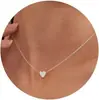 2025 Moda Estilo Luxo Leve Colar com Pingente de Coração para Mulheres Corrente de Clavícula Versátil Dourada Joia de Design de Nicho