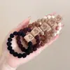 Gomas para el pelo de niños, nuevo estilo 2026, con diseño de lazo, bandas elásticas para el pelo para niñas, suaves con el pelo, alta elasticidad, círculos para coleta, accesorios para el pelo